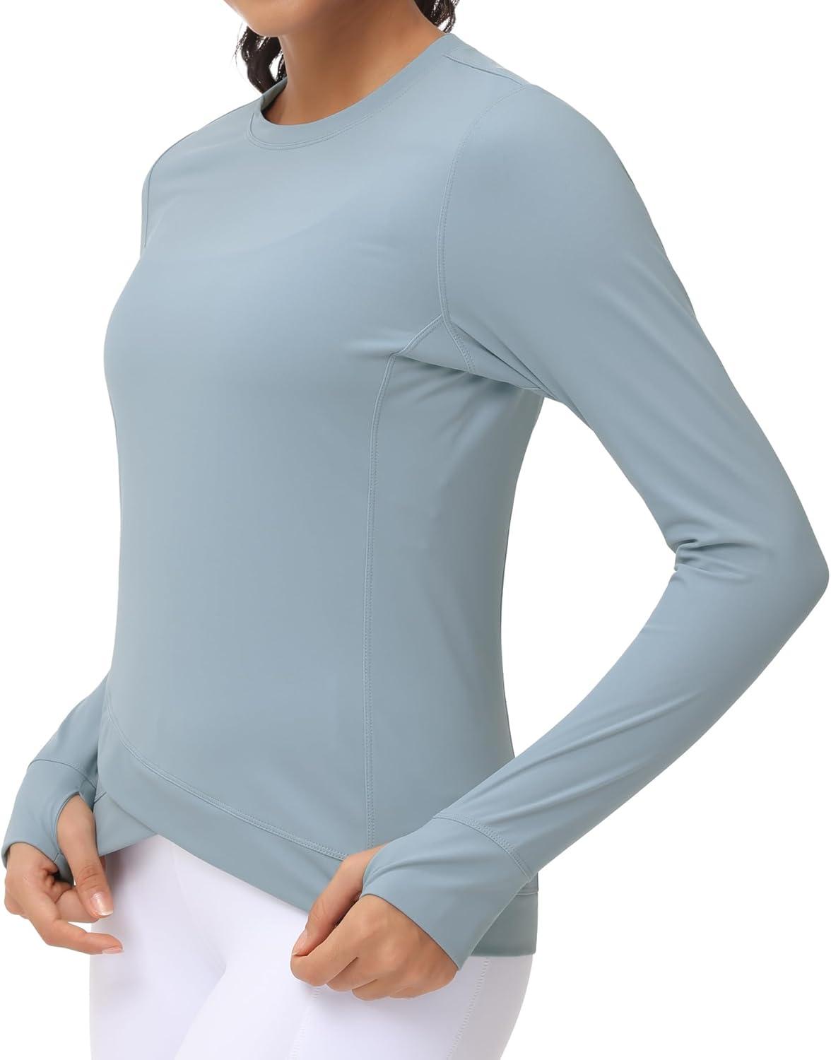 imageWomens Long Sleeve Compression Shirts Workout Tops Cross Hem Athletic Running Yoga TShirts with Thumb HoleDenim Blue