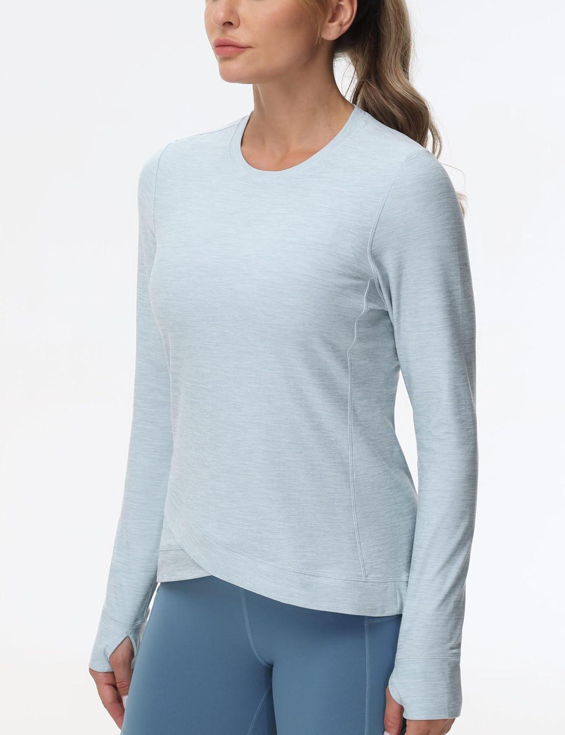 imageWomens Long Sleeve Compression Shirts Workout Tops Cross Hem Athletic Running Yoga TShirts with Thumb HoleLight Blue Heather