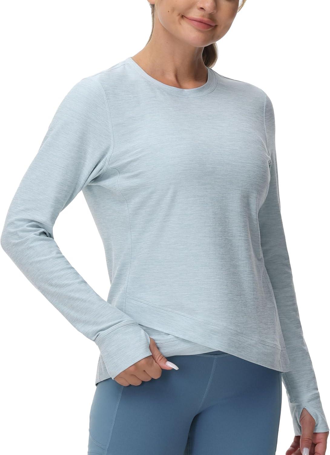imageWomens Long Sleeve Compression Shirts Workout Tops Cross Hem Athletic Running Yoga TShirts with Thumb HoleLight Blue Heather