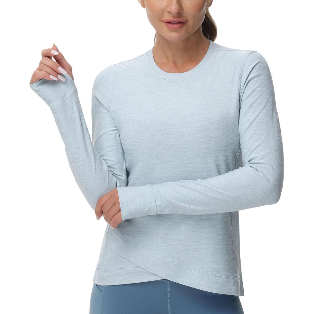 imageWomens Long Sleeve Compression Shirts Workout Tops Cross Hem Athletic Running Yoga TShirts with Thumb HoleLight Blue Heather