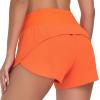 imageTHE GYM PEOPLE Womens High Waisted Worktout Shorts Quick Dry Running Athletic Shorts with Mesh Liner Zipper PocketOrange