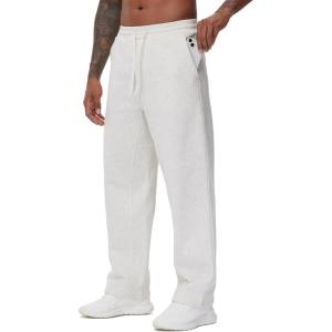 imageTHE GYM PEOPLE Mens Baggy Fleece Workout Sweatpants with Pockets Drawstring Lounge Athletic Running PantsHeather White
