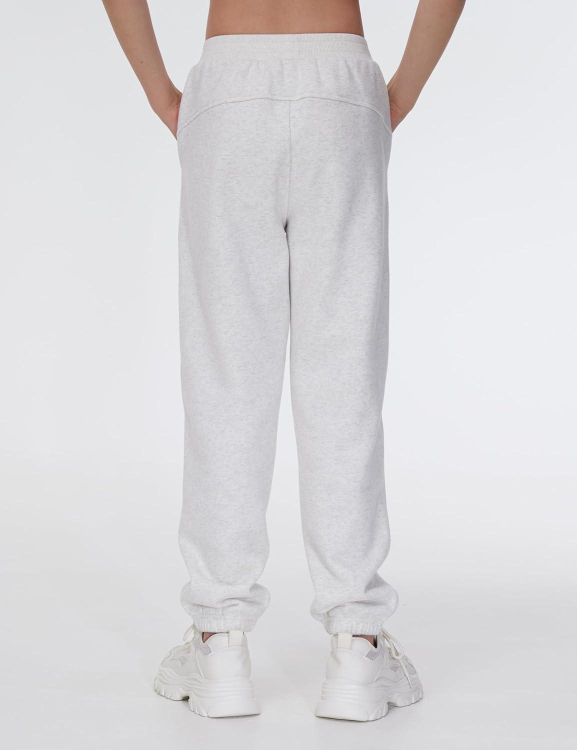 imageTHE GYM PEOPLE Girls Fleece Tapered Workout Sweatpants Warm Soft Athletic Joggers Pants with PocketsHeather White
