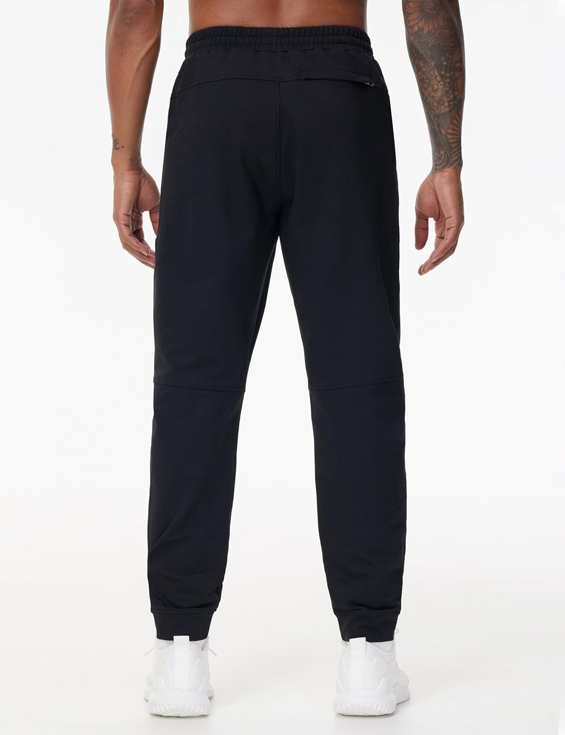 imageTHE GYM PEOPLE Mens Drawstring Workout Joggers Pants Lightweight Tapered Running Lounge Sweatpants with PocketsBlack