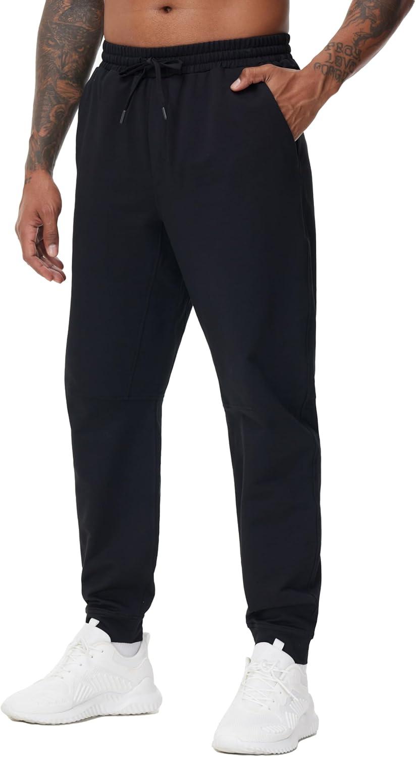 imageTHE GYM PEOPLE Mens Drawstring Workout Joggers Pants Lightweight Tapered Running Lounge Sweatpants with PocketsBlack