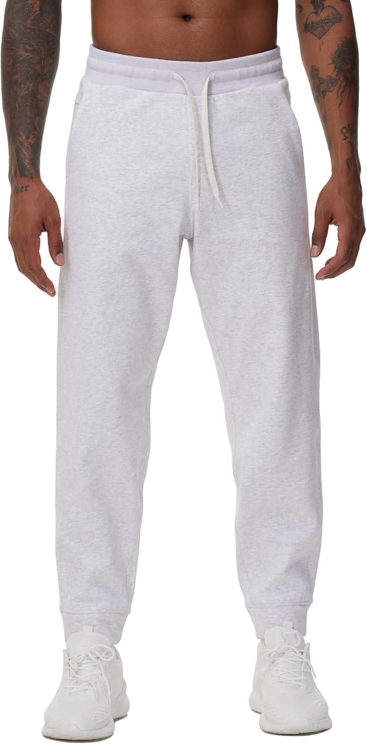 imageTHE GYM PEOPLE Mens Fleece Joggers Pants with Deep Pockets in Loosefit StyleFleece Lined Heather White