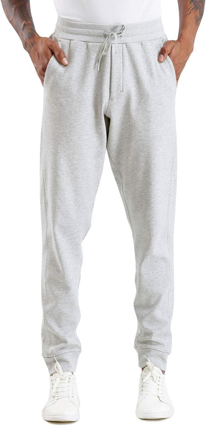 imageTHE GYM PEOPLE Mens Fleece Joggers Pants with Deep Pockets in Loosefit StyleUnlined Lightweight Basic Light Grey