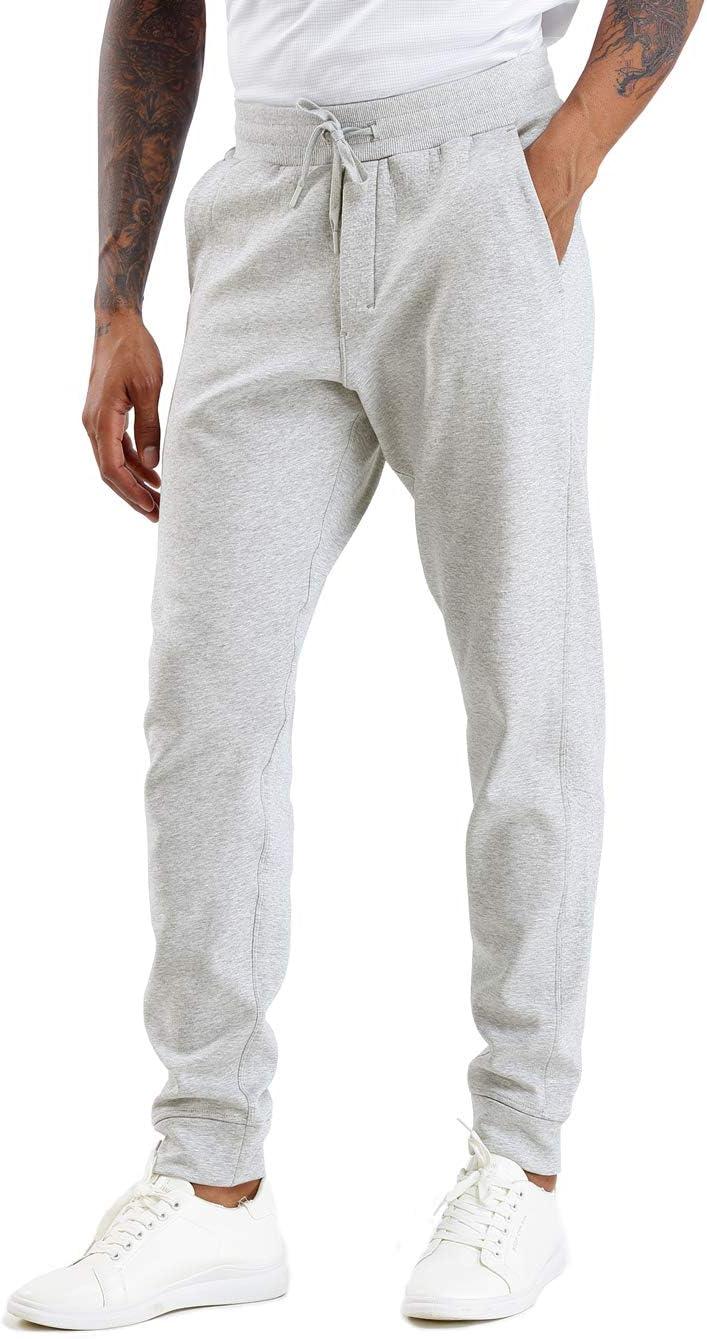 imageTHE GYM PEOPLE Mens Fleece Joggers Pants with Deep Pockets in Loosefit StyleUnlined Lightweight Basic Light Grey