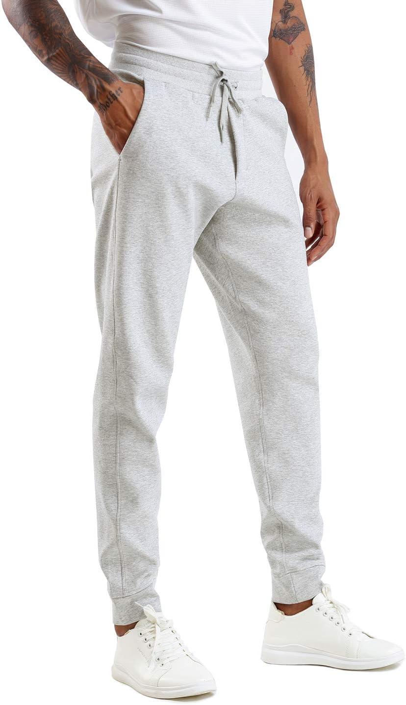 imageTHE GYM PEOPLE Mens Fleece Joggers Pants with Deep Pockets in Loosefit StyleUnlined Lightweight Basic Light Grey