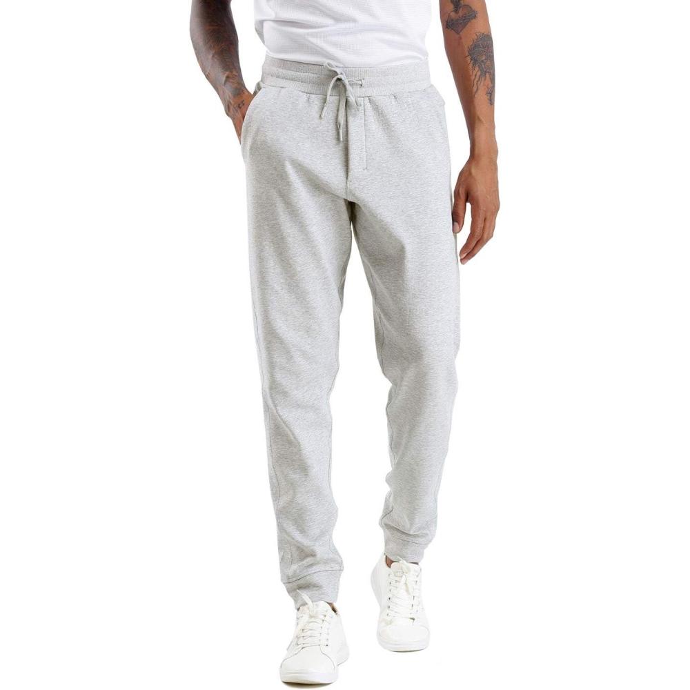 imageTHE GYM PEOPLE Mens Fleece Joggers Pants with Deep Pockets in Loosefit StyleUnlined Lightweight Basic Light Grey