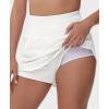 imageTHE GYM PEOPLE Womens Athletic Shorts Elastic Waisted Quick Dry Ruffle Tennis Workout Skorts with Mesh Liner Zip PocketsWhite