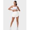 imageTHE GYM PEOPLE Womens Athletic Shorts Elastic Waisted Quick Dry Ruffle Tennis Workout Skorts with Mesh Liner Zip PocketsWhite