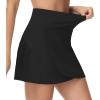 imageTHE GYM PEOPLE Womens High Waisted Tennis Skirts Crossover Hemline Back Pleated Golf Skorts with Inner ShortsBlack