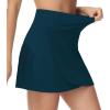 imageTHE GYM PEOPLE Womens High Waisted Tennis Skirts Crossover Hemline Back Pleated Golf Skorts with Inner ShortsDark Blue Green