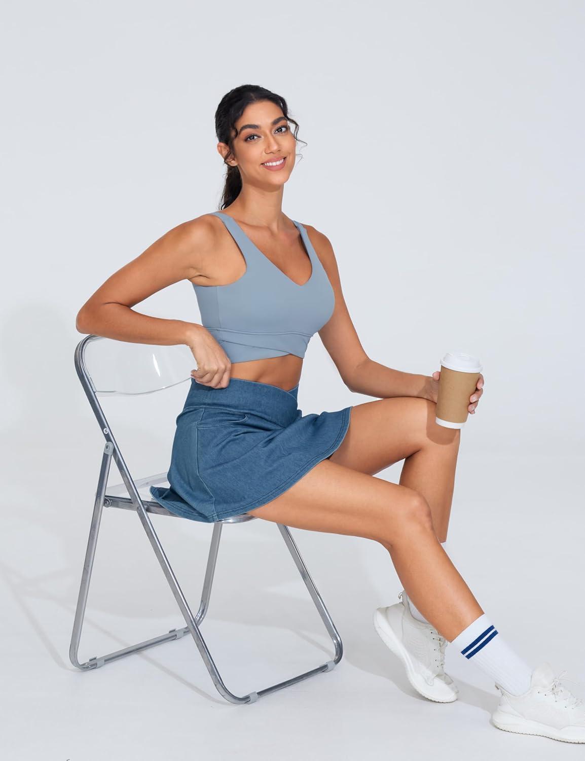 imageTHE GYM PEOPLE Womens Cross Waist Jean Skorts Stretchy Ruffle Denim Skirts with 2 in 1 Shorts PocketsDenim Blue