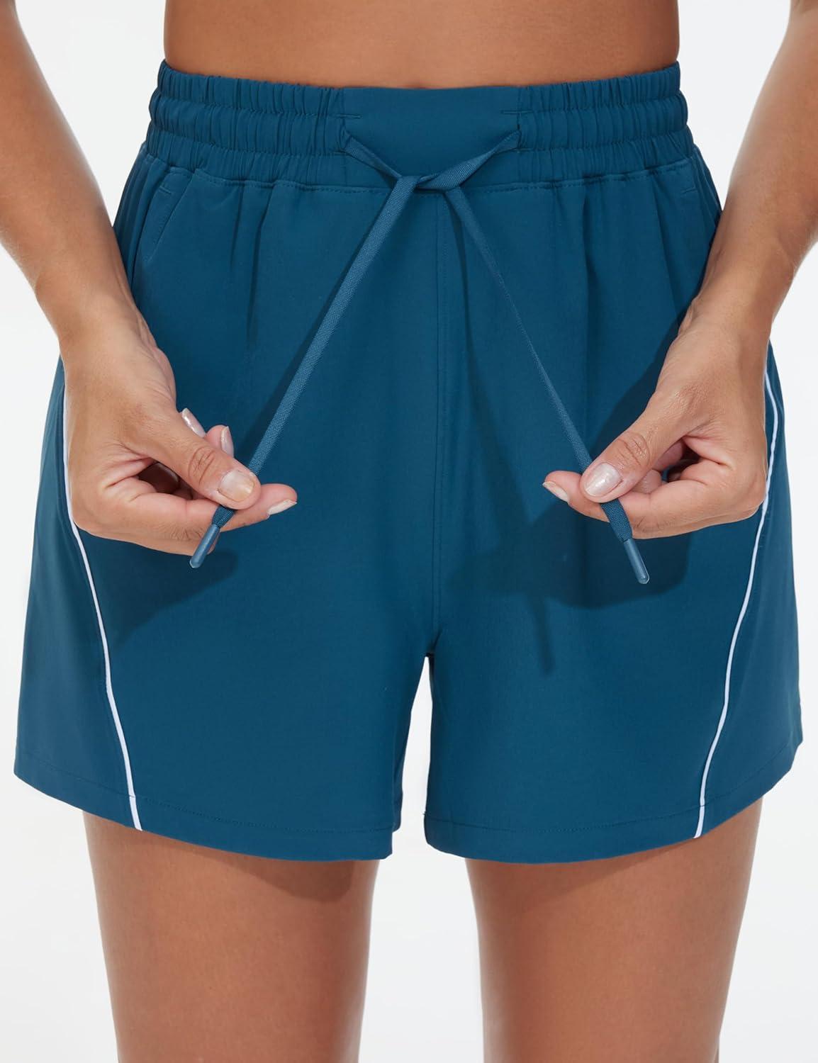 imageTHE GYM PEOPLE Womens High Waist Running Shorts with Pockets Loose Fit Lightweight Workout Yoga Athletic TracksDark Blue Green