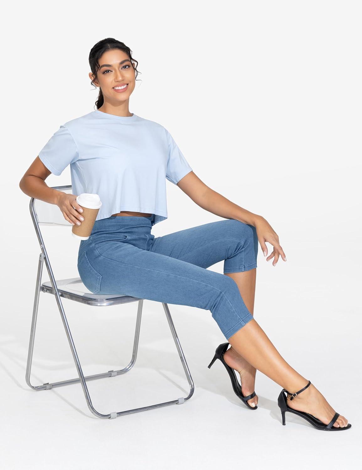 imageTHE GYM PEOPLE Womens High Waisted Stretchy Capri Jeggings Pants Tummy Control Pull on Skinny Jean Leggings with PocketsDenim Blue