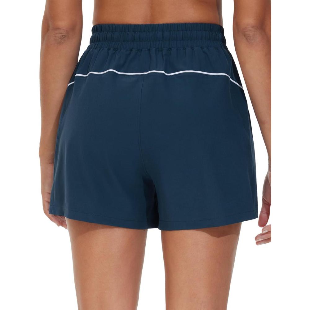 imageTHE GYM PEOPLE Womens High Waist Running Shorts with Pockets Loose Fit Lightweight Workout Yoga Athletic TracksBlue