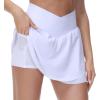 imageTHE GYM PEOPLE Womens Cross Waist Tennis Skirts with Cutting Hem Golf Skorts with Inner Mesh Pockets ShortsWhite