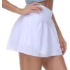 imageTHE GYM PEOPLE Womens Cross Waist Tennis Skirts with Cutting Hem Golf Skorts with Inner Mesh Pockets ShortsWhite